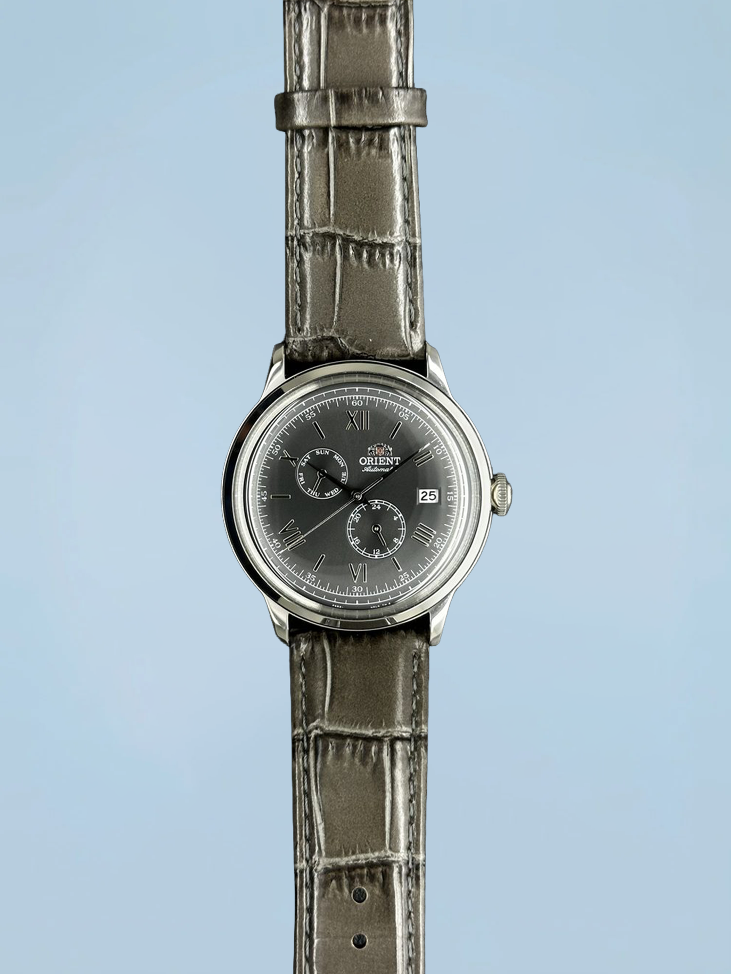 Orient Bambino V2 Automático Multifunção Cinza Numerais Romanos Couro